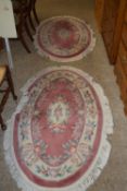 TWO OVAL CUT WOOL RUGS, LENGTH APPROX 158CM