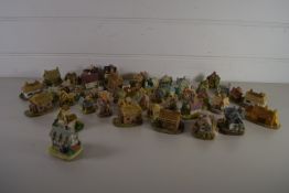 BOX CONTAINING MINIATURE MODEL COTTAGES, VARIOUS MAKES