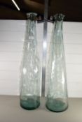 TWO LARGE GREEN TINTED GLASS VASES