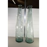 TWO LARGE GREEN TINTED GLASS VASES