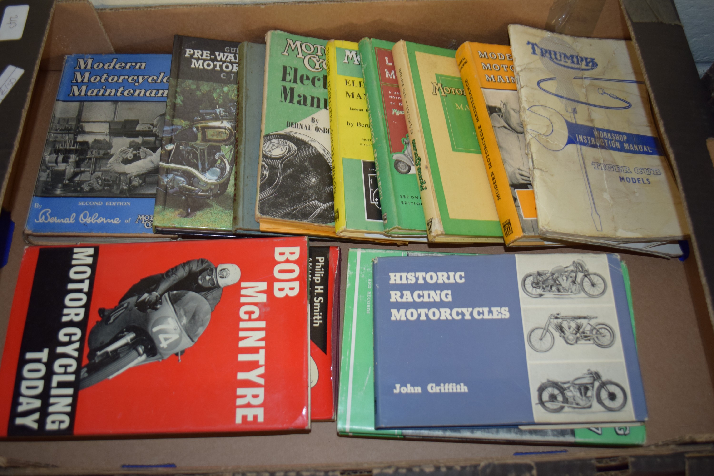 TWO BOXES CONTAINING MOTORCYCLE MEMORABILIA, FOUR VARIOUS MODELS - BSA BANTAM, AJS, BSA TWINS ETC