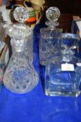FOUR GLASS DECANTERS