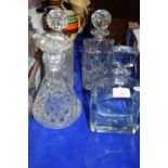 FOUR GLASS DECANTERS