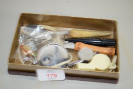 BOX CONTAINING TWO WHISTLES ETC