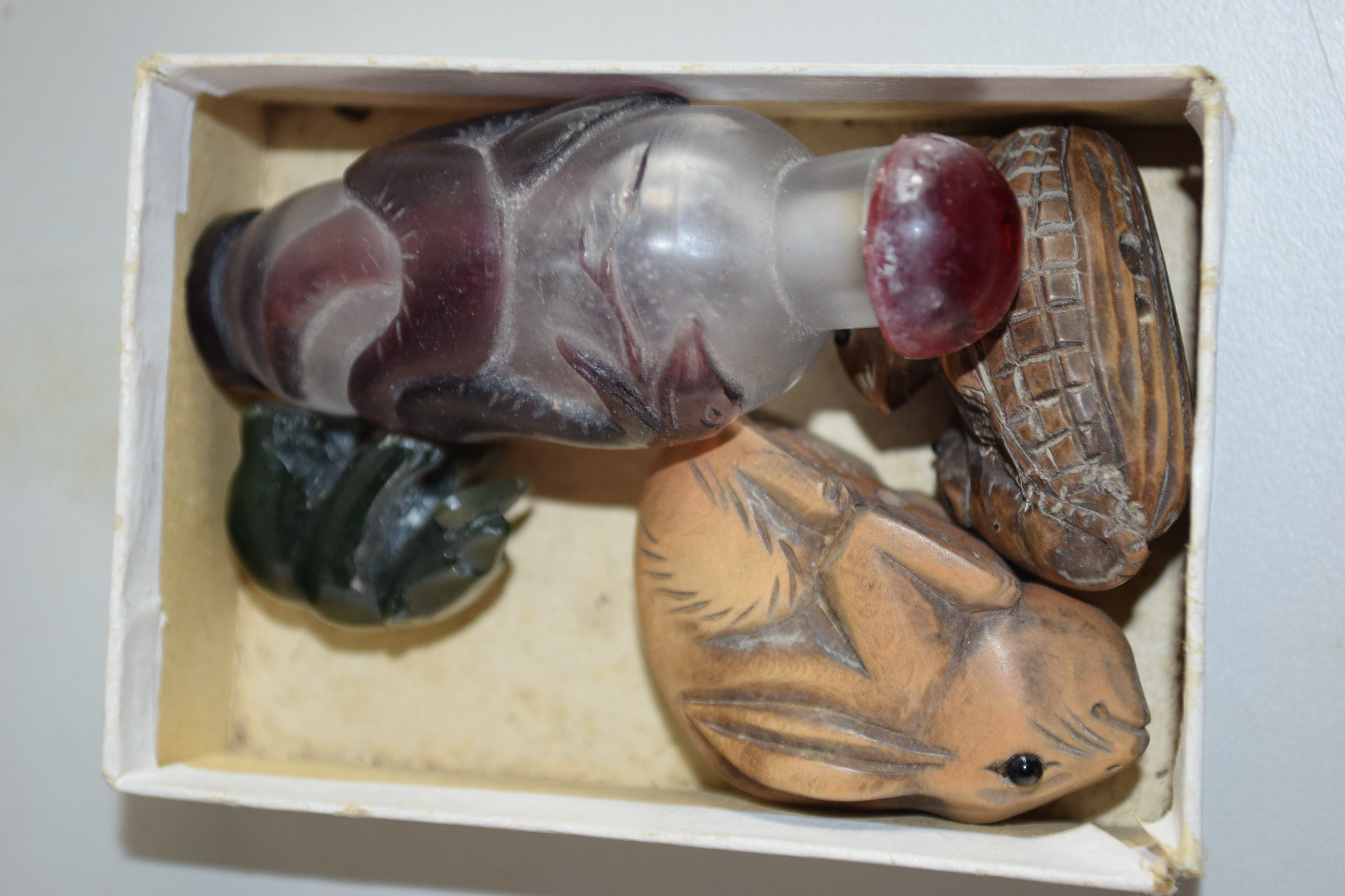BOX CONTAINING NETSUKE AND ORIENTAL SCENT BOTTLE MODELLED WITH A DRAGON
