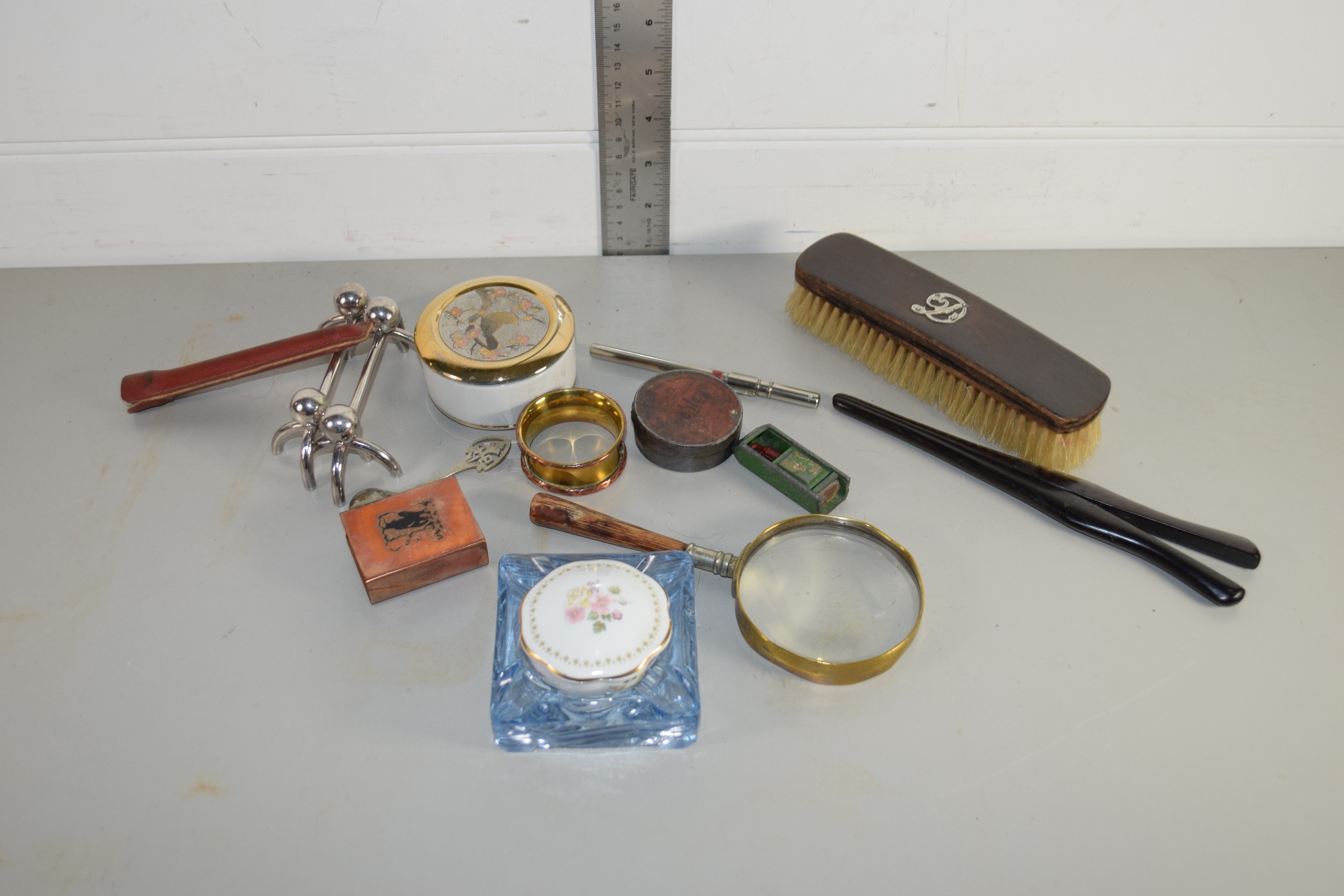 BOX CONTAINING METAL WARES, KNIFE RESTS, POMADE POT AND COVER ETC, HAIR BRUSH
