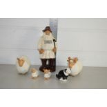 POTTERY MODEL OF A SHEPHERD TOGETHER WITH TWO SHEEP AND SHEEP DOG