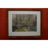 L W Humphreys, Watercolour, Woodland Landscape dated 1945, 26cm x 37cm