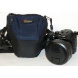 Fujifilm Finepix S100 FS digital camera, together with Fujinon zoom lens, 7.1 x 101.5mm lens in