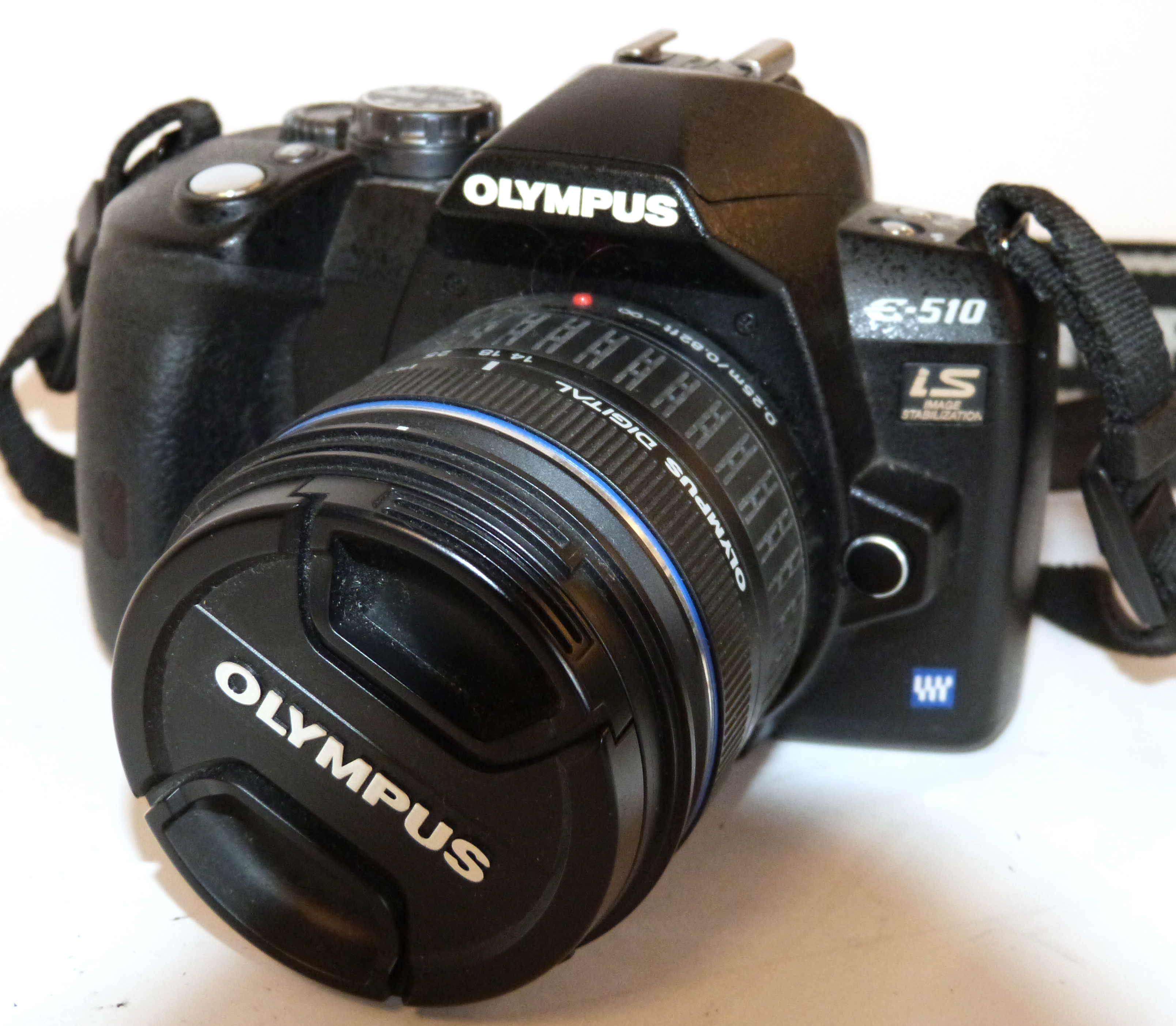 Olympus E-510 digital camera, together with Zuiko digital 14-42mm lens, charger and fitted case
