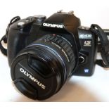 Olympus E-510 digital camera, together with Zuiko digital 14-42mm lens, charger and fitted case