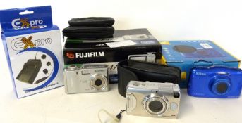 Fujifilm F470, a Nikon Coolpix 533 and a Finecam S3R
