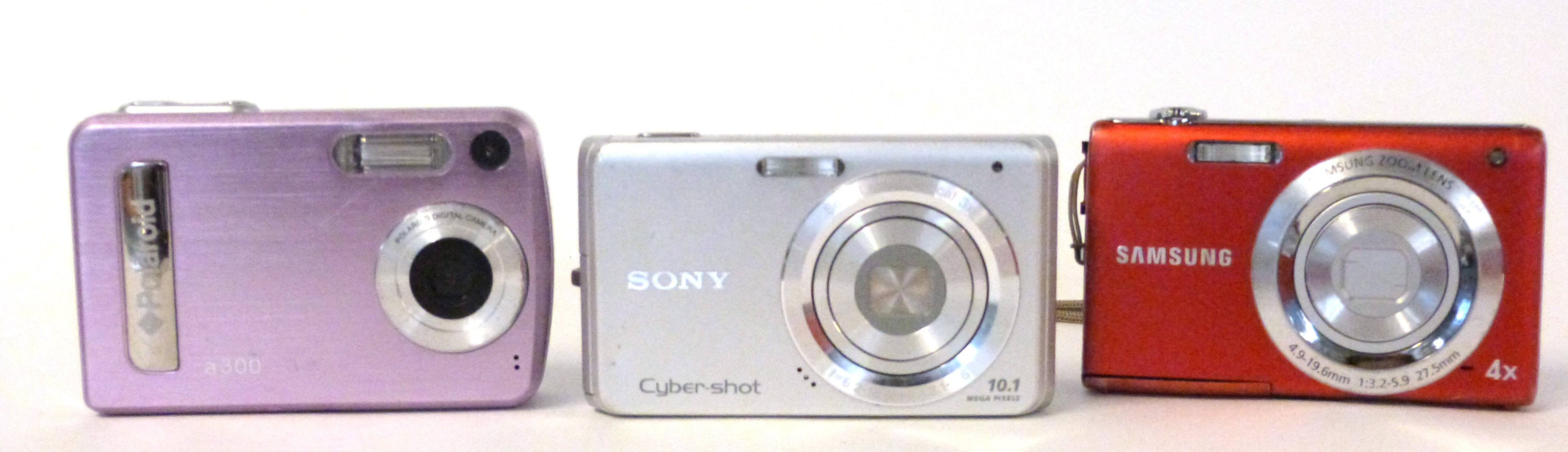 Samsung ST61 digital camera, a Sony DSC-W180 digital camera with a Polaroid A300 digital camera