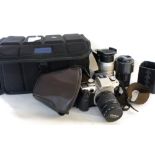 Canon EOS 50E film camera plus a Canon zoom lens EF 28-80mm and Sigma zoom 100-300mm lens and a