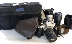 Canon EOS 50E film camera plus a Canon zoom lens EF 28-80mm and Sigma zoom 100-300mm lens and a
