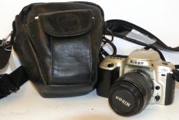 Nikon F50 film camera, together with Nikon AF Nikkor 35-80mm lens in case