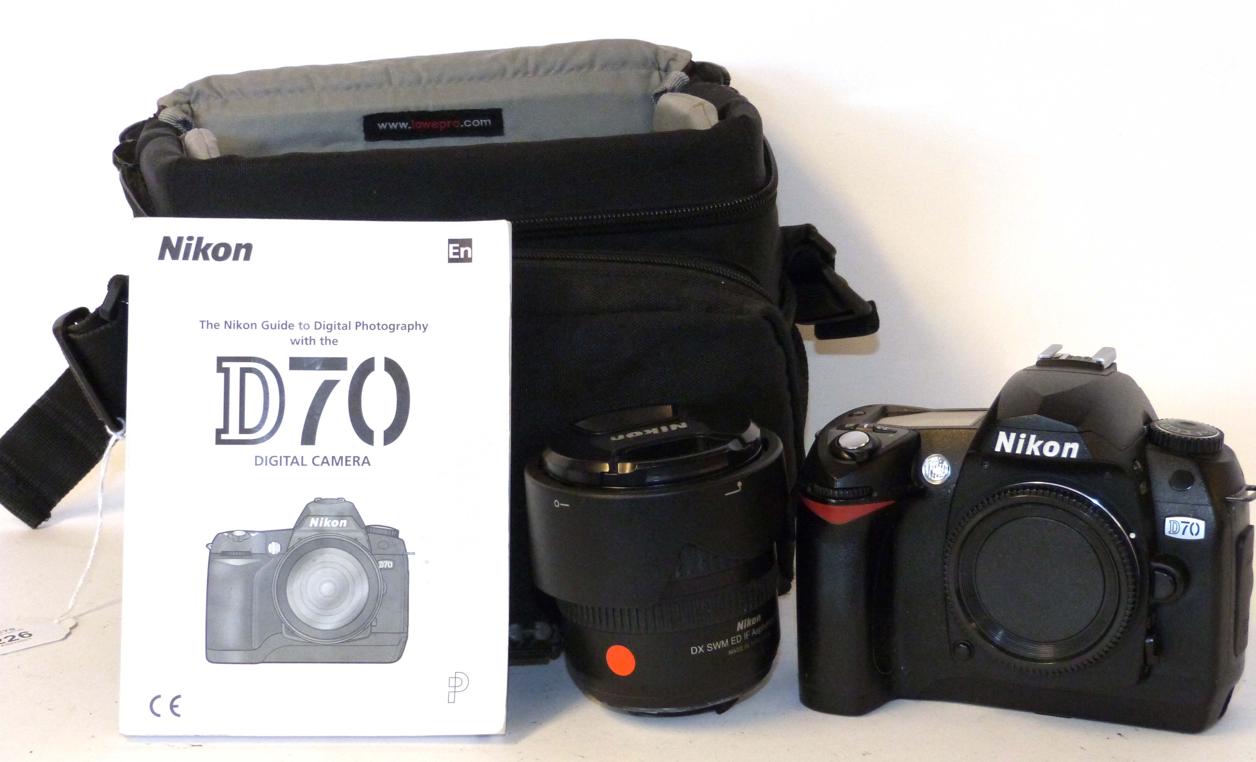 Nikon D70 digital camera together with Nikon AF-S Nikkor 18-70mm lens, charger and fitted case