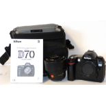 Nikon D70 digital camera together with Nikon AF-S Nikkor 18-70mm lens, charger and fitted case