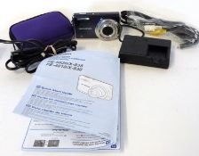 Olympus FE-5020 plus charger and manual