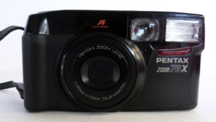 Pentax zoom 70-X film camera together with case and manual