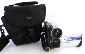 Sony DCR-DVD109 camcorder together with accessories in bag