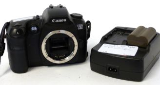 Canon EOS D30 digital camera with Canon compact power adapter