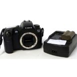 Canon EOS D30 digital camera with Canon compact power adapter