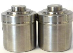 Pair of film developing canisters