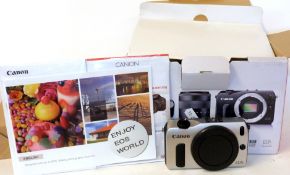 Canon EOS M digital camera with Canon zoom lens EF-M 18-55mm plus box and accessories