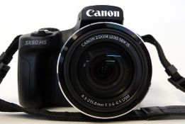 Canon Powershot SX50 HS plus manual, charger and box