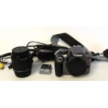 Canon EOS 1100D digital camera together with Canon EFS 18-55mm lens and charger