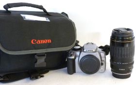 Canon EOS 350D digital camera plus a Canon Zoom lens EF100-300mm, bag and manual