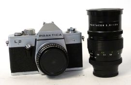 Praktica L2 film camera with Domiplan 2.8/50 lens + Pentacon 2.8 flash 135 lens in bag