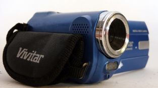 Vivitar DVR508 NHD video camera plus charger and mini-tripod