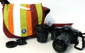 Minolta Dynax 7xi film camera together with Minolta AF zoom 75-300mm + Minolta AF zoom 28-105mm lens