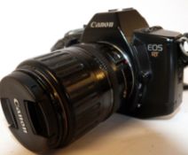 Canon EOS RT film camera together with Canon 35-135mm lens