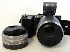 Sony NEX-5N digital camera plus a Sony 18-55mm lens plus a Sony 2.8/16 lens, and charger and manual