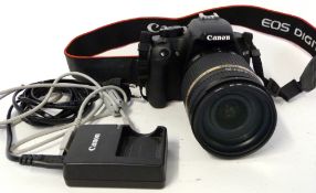 Canon EOS 1000D digital camera together with Tamron 18-270mm lens plus charger