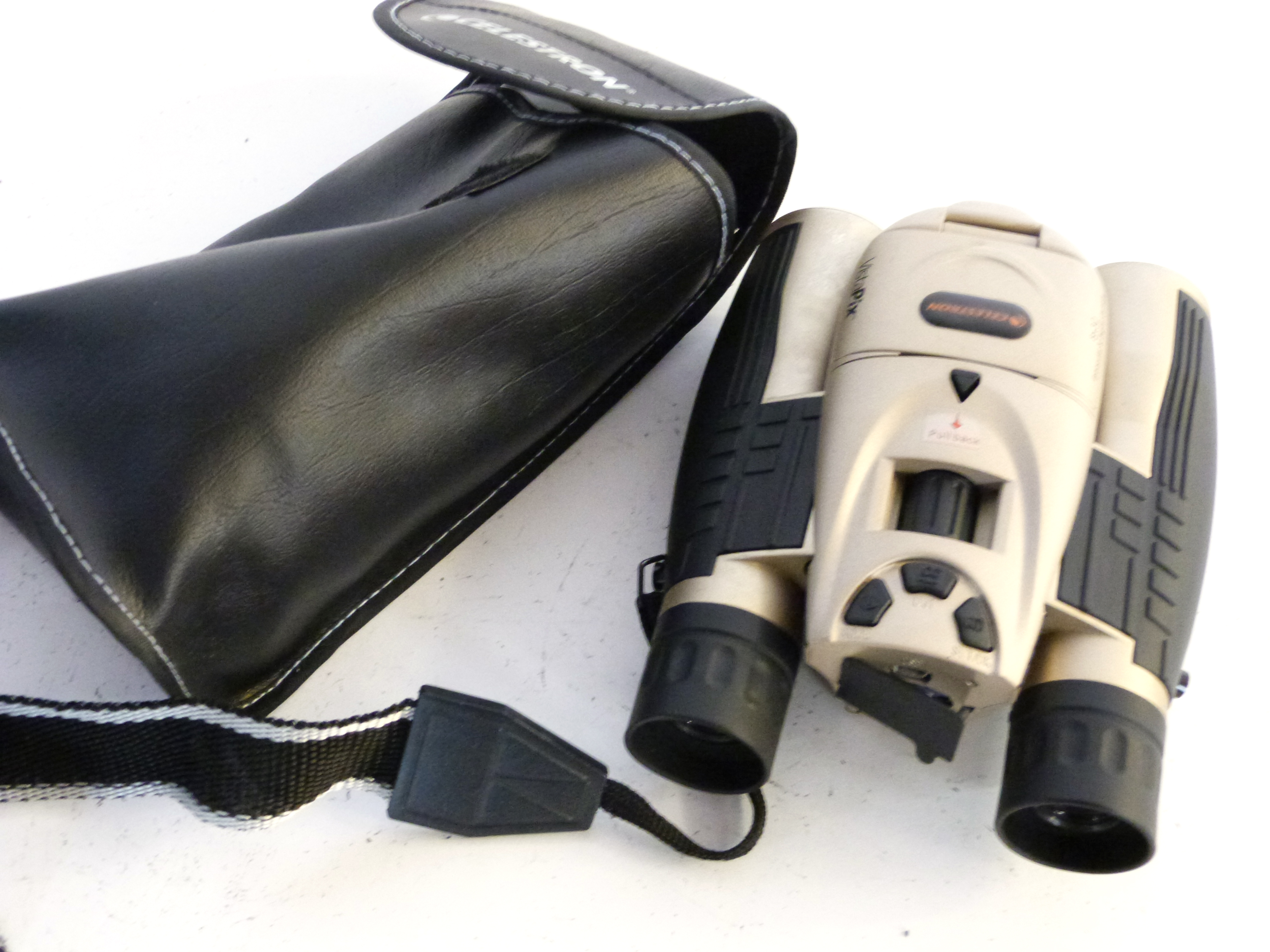 Celestron Vistapix 8x32 binoculars/digital camera together with hard case and manual