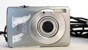 Canon Ixus 75 digital camera, together with charger and manual