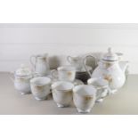 NORITAKE TEA SET COMPRISING TEA POT, MILK JUG, SUGAR BOWL AND SEVEN CUPS, SAUCERS AND SIDE PLATES