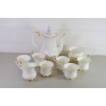 ROYAL ALBERT TEA SET IN THE VAL D'OR PATTERN COMPRISING TEA POT, MILK JUG, SUGAR BOWL AND SIX CUPS