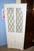 WHITE PAINTED WOOD CORNER CABINET WITH LEADED GLAZING, WIDTH APPROX 66CM MAX