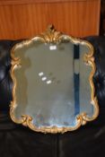 MODERN ORNATE GILT FRAMED WALL MIRROR, APPROX 53 X 68CM MAX