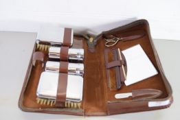 CASED LEATHER GENTLEMAN'S TOILET SET CONTAINING VARIOUS BRUSHES, SCISSORS, COMB ETC