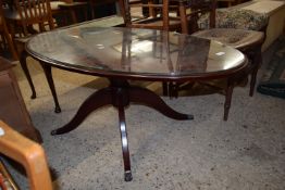 GLASS TOPPED OVAL MAHOGANY EFFECT COFFEE TABLE, APPROX 120 X 58CM