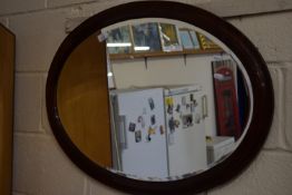 MAHOGANY FRAMED OVAL OVERMANTEL MIRROR, APPROX 85 X 58CM