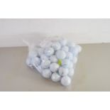 BAG CONTAINING 50 GOLF BALLS IN GOOD CONDITION