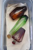 BOX CONTAINING TWO AMBER COLOURED SCENT BOTTLES AND FURTHER GREEN COLOURED SCENT BOTTLE OF FACETED