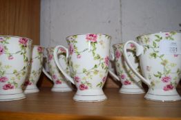 SET OF SIX FLORAL DECORATED MUGS BY CLAYRE & EEF